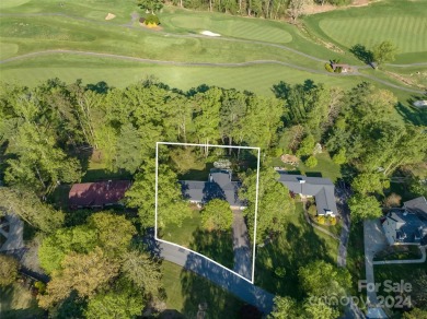 Perched on the 16th fairway of the prestigious Country Club of on Country Club of Asheville in North Carolina - for sale on GolfHomes.com, golf home, golf lot