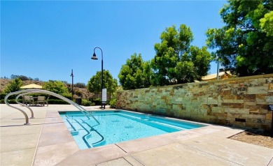This modern turnkey home features three bedrooms, two and a half on Glen Ivy Golf Club in California - for sale on GolfHomes.com, golf home, golf lot