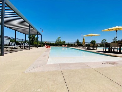 This modern turnkey home features three bedrooms, two and a half on Glen Ivy Golf Club in California - for sale on GolfHomes.com, golf home, golf lot