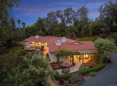 Nestled on a sprawling 2.9 acres, this stunning property boasts on Rancho Santa Fe Golf Club in California - for sale on GolfHomes.com, golf home, golf lot