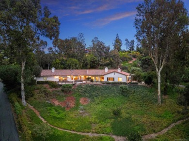 Nestled on a sprawling 2.9 acres, this stunning property boasts on Rancho Santa Fe Golf Club in California - for sale on GolfHomes.com, golf home, golf lot