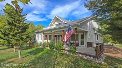 This unique Craftsman-style home offers 1 and a half stories and on Springport Hills Golf Course in Michigan - for sale on GolfHomes.com, golf home, golf lot