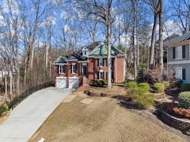 This stunning 4BD/3.5BA home is beautifully updated in the on Towne Lake Hills Golf Club in Georgia - for sale on GolfHomes.com, golf home, golf lot