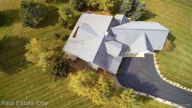 This unique Craftsman-style home offers 1 and a half stories and on Springport Hills Golf Course in Michigan - for sale on GolfHomes.com, golf home, golf lot