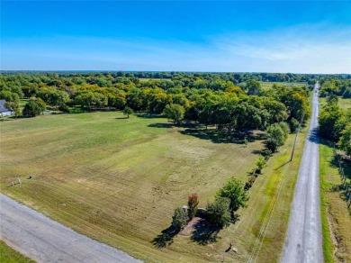 This prime corner lot is nestled in the peaceful, upscale on Denison Country Club in Texas - for sale on GolfHomes.com, golf home, golf lot