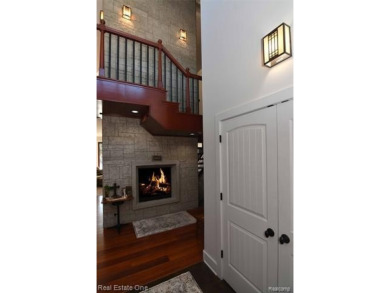 This unique Craftsman-style home offers 1 and a half stories and on Springport Hills Golf Course in Michigan - for sale on GolfHomes.com, golf home, golf lot