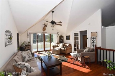 This unique Craftsman-style home offers 1 and a half stories and on Springport Hills Golf Course in Michigan - for sale on GolfHomes.com, golf home, golf lot