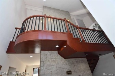 This unique Craftsman-style home offers 1 and a half stories and on Springport Hills Golf Course in Michigan - for sale on GolfHomes.com, golf home, golf lot