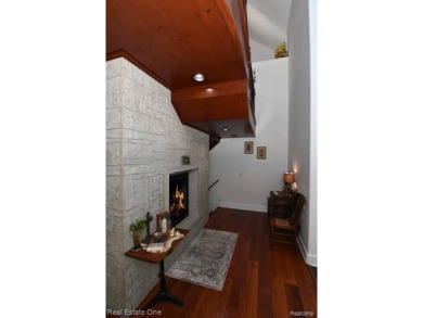This unique Craftsman-style home offers 1 and a half stories and on Springport Hills Golf Course in Michigan - for sale on GolfHomes.com, golf home, golf lot