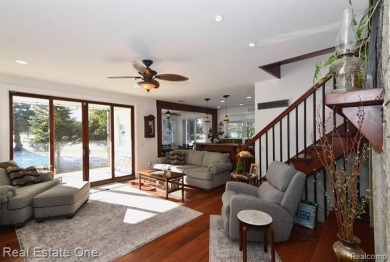 This unique Craftsman-style home offers 1 and a half stories and on Springport Hills Golf Course in Michigan - for sale on GolfHomes.com, golf home, golf lot