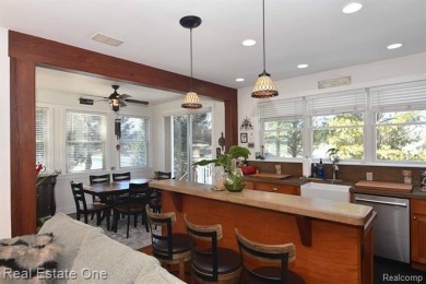 This unique Craftsman-style home offers 1 and a half stories and on Springport Hills Golf Course in Michigan - for sale on GolfHomes.com, golf home, golf lot
