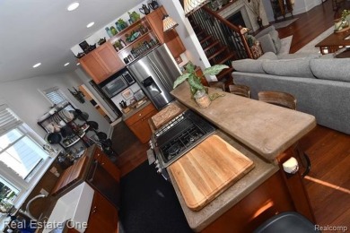 This unique Craftsman-style home offers 1 and a half stories and on Springport Hills Golf Course in Michigan - for sale on GolfHomes.com, golf home, golf lot