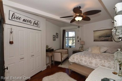 This unique Craftsman-style home offers 1 and a half stories and on Springport Hills Golf Course in Michigan - for sale on GolfHomes.com, golf home, golf lot