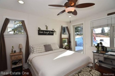 This unique Craftsman-style home offers 1 and a half stories and on Springport Hills Golf Course in Michigan - for sale on GolfHomes.com, golf home, golf lot