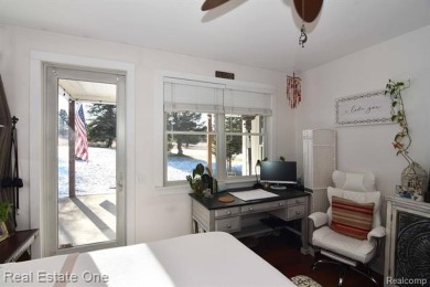 This unique Craftsman-style home offers 1 and a half stories and on Springport Hills Golf Course in Michigan - for sale on GolfHomes.com, golf home, golf lot