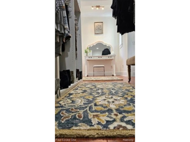 This unique Craftsman-style home offers 1 and a half stories and on Springport Hills Golf Course in Michigan - for sale on GolfHomes.com, golf home, golf lot