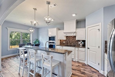 Experience outdoor-living meets modern convenience in beautiful on Bella Vista - Metfield Golf Complex and Country Club in Arkansas - for sale on GolfHomes.com, golf home, golf lot