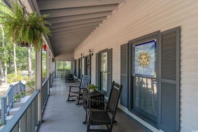 CHECK OUT THIS COZY LOW COUNTRY HOME!!!! This home sits on a on Wedgefield Plantation Golf Club in South Carolina - for sale on GolfHomes.com, golf home, golf lot