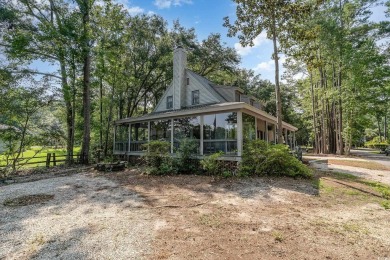 CHECK OUT THIS COZY LOW COUNTRY HOME!!!! This home sits on a on Wedgefield Plantation Golf Club in South Carolina - for sale on GolfHomes.com, golf home, golf lot