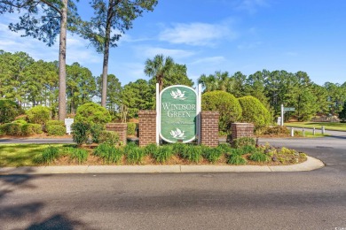 Welcome to easy coastal living at its best! This bright and on  in South Carolina - for sale on GolfHomes.com, golf home, golf lot