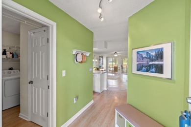 Welcome to easy coastal living at its best! This bright and on  in South Carolina - for sale on GolfHomes.com, golf home, golf lot