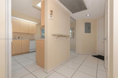WELL PRICED 1st FLOOR CORNER UNIT in Century Village with 1,507 on Flamingo Lakes Country Club in Florida - for sale on GolfHomes.com, golf home, golf lot