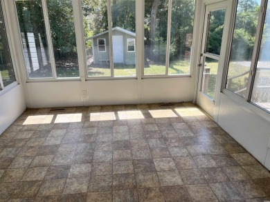 Welcome to this charming 3-bedroom, 2-bath brick ranch located on Beachwood Golf Club in South Carolina - for sale on GolfHomes.com, golf home, golf lot