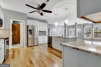 Luxury Golf Course Living with a Fully Finished In-Law Suite on Summergrove Golf Club in Georgia - for sale on GolfHomes.com, golf home, golf lot