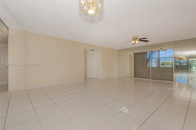 WELL PRICED 1st FLOOR CORNER UNIT in Century Village with 1,507 on Flamingo Lakes Country Club in Florida - for sale on GolfHomes.com, golf home, golf lot