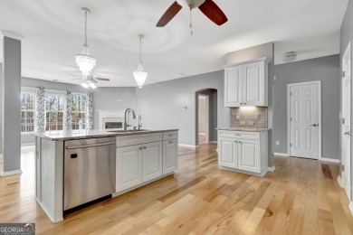 Luxury Golf Course Living with a Fully Finished In-Law Suite on Summergrove Golf Club in Georgia - for sale on GolfHomes.com, golf home, golf lot