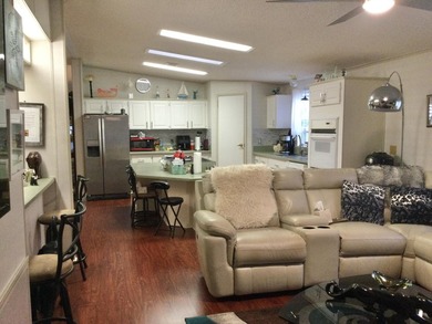 ONE OF THE LARGEST HOMES IN THIS COMMUNITY. THIS 1560 SF HOME IS on Spanish Lakes I in Florida - for sale on GolfHomes.com, golf home, golf lot