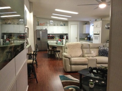 ONE OF THE LARGEST HOMES IN THIS COMMUNITY. THIS 1560 SF HOME IS on Spanish Lakes I in Florida - for sale on GolfHomes.com, golf home, golf lot