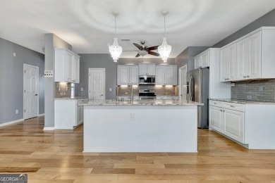 Luxury Golf Course Living with a Fully Finished In-Law Suite on Summergrove Golf Club in Georgia - for sale on GolfHomes.com, golf home, golf lot