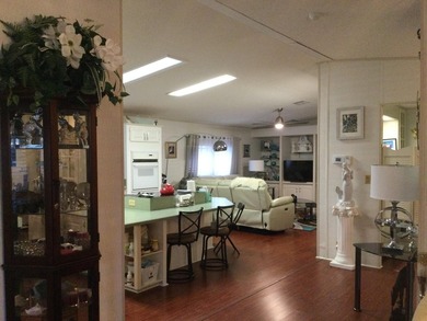 ONE OF THE LARGEST HOMES IN THIS COMMUNITY. THIS 1560 SF HOME IS on Spanish Lakes I in Florida - for sale on GolfHomes.com, golf home, golf lot