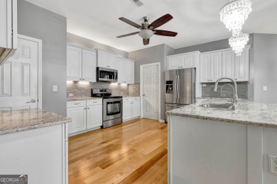 Luxury Golf Course Living with a Fully Finished In-Law Suite on Summergrove Golf Club in Georgia - for sale on GolfHomes.com, golf home, golf lot