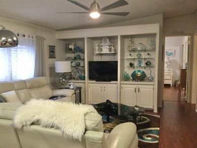 ONE OF THE LARGEST HOMES IN THIS COMMUNITY. THIS 1560 SF HOME IS on Spanish Lakes I in Florida - for sale on GolfHomes.com, golf home, golf lot