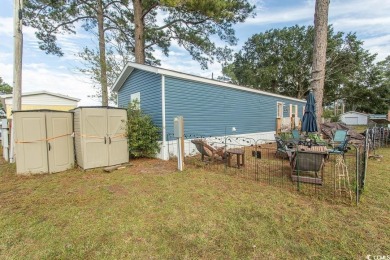Welcome to Crystal Lake on the border of Surfside Beach and on Prestwick Country Club in South Carolina - for sale on GolfHomes.com, golf home, golf lot