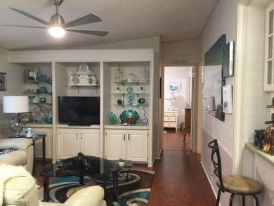 ONE OF THE LARGEST HOMES IN THIS COMMUNITY. THIS 1560 SF HOME IS on Spanish Lakes I in Florida - for sale on GolfHomes.com, golf home, golf lot