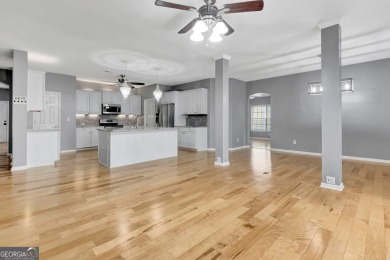 Luxury Golf Course Living with a Fully Finished In-Law Suite on Summergrove Golf Club in Georgia - for sale on GolfHomes.com, golf home, golf lot