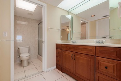 WELL PRICED 1st FLOOR CORNER UNIT in Century Village with 1,507 on Flamingo Lakes Country Club in Florida - for sale on GolfHomes.com, golf home, golf lot