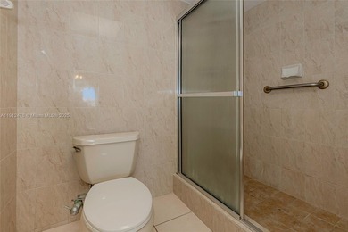 WELL PRICED 1st FLOOR CORNER UNIT in Century Village with 1,507 on Flamingo Lakes Country Club in Florida - for sale on GolfHomes.com, golf home, golf lot