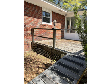 Welcome to this charming 3-bedroom, 2-bath brick ranch located on Beachwood Golf Club in South Carolina - for sale on GolfHomes.com, golf home, golf lot