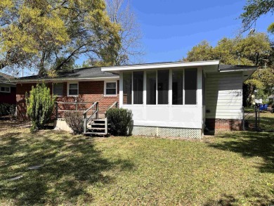 Welcome to this charming 3-bedroom, 2-bath brick ranch located on Beachwood Golf Club in South Carolina - for sale on GolfHomes.com, golf home, golf lot