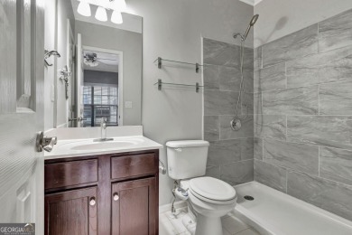 Luxury Golf Course Living with a Fully Finished In-Law Suite on Summergrove Golf Club in Georgia - for sale on GolfHomes.com, golf home, golf lot