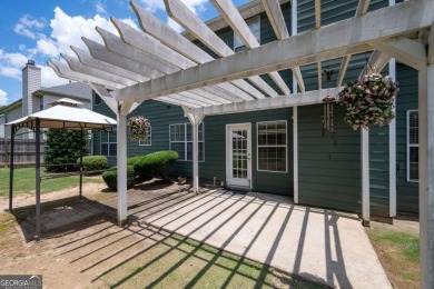 Nestled in highly sought-after Curtis Farm, this beautiful on Woodmont Golf and Country Club in Georgia - for sale on GolfHomes.com, golf home, golf lot