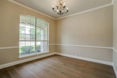 2.3 miles from the Dallas North Tollway is this stunning home in on The Trails of Frisco Golf Club in Texas - for sale on GolfHomes.com, golf home, golf lot