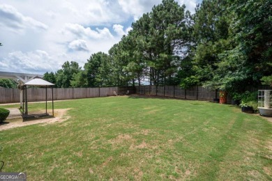 Nestled in highly sought-after Curtis Farm, this beautiful on Woodmont Golf and Country Club in Georgia - for sale on GolfHomes.com, golf home, golf lot