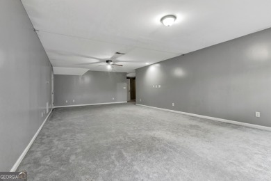 Luxury Golf Course Living with a Fully Finished In-Law Suite on Summergrove Golf Club in Georgia - for sale on GolfHomes.com, golf home, golf lot