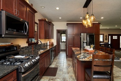 Welcome to your dream home nestled on a serene corner cul-de-sac on Deer Run Golf Club and DR in Iowa - for sale on GolfHomes.com, golf home, golf lot