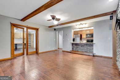 Luxury Golf Course Living with a Fully Finished In-Law Suite on Summergrove Golf Club in Georgia - for sale on GolfHomes.com, golf home, golf lot